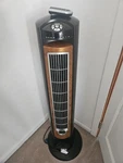 Lasso Oscillating Tower Fan, Remote Control, Ionizer. 3 Speeds, Black. Fixed Price $65.00.