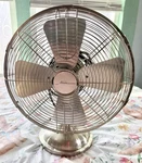 Aloha Breeze 46016 12" Oscillating 3 Speed Silver Table Fan Standing. Fixed Price $44.97.