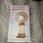 Cool Comfort Handheld Mini Fan Rechargeable Usb Brown Pink Adjustable Tilt. Fixed Price $8.99.