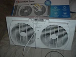 Comfort Zone CZ319WT Twin Window Fan With Reversible Airflow Control, Auto-lo. Fixed Price $40.00.