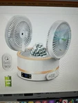 Doulfan Rechargeable Rotating Table W Light. Fixed Price $37.00.