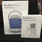 Blaux Classic Desktop Ac Portable Cooling Fan With Blue Mood Light And Curtain. Fixed Price $26.95.