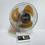 Vtg Panasonic 3 Speed Oscillating Desk Fan Translucent Amber Blades F-1208B. Fixed Price $89.99.